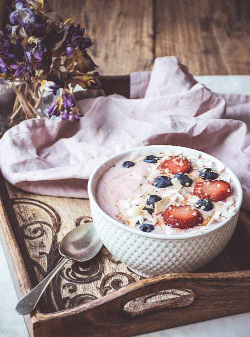 Creamed Strawberry Oats topped with Berries & Hemp Hearts